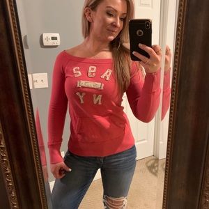 Salmon colored A&F sweatshirt with front pocket